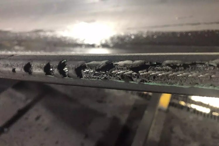This is an example of conveyor belt damage.